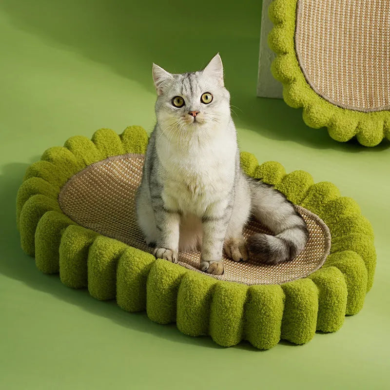Green oval sisal cat scratching pad bowl serving as a cat bed and furniture protector