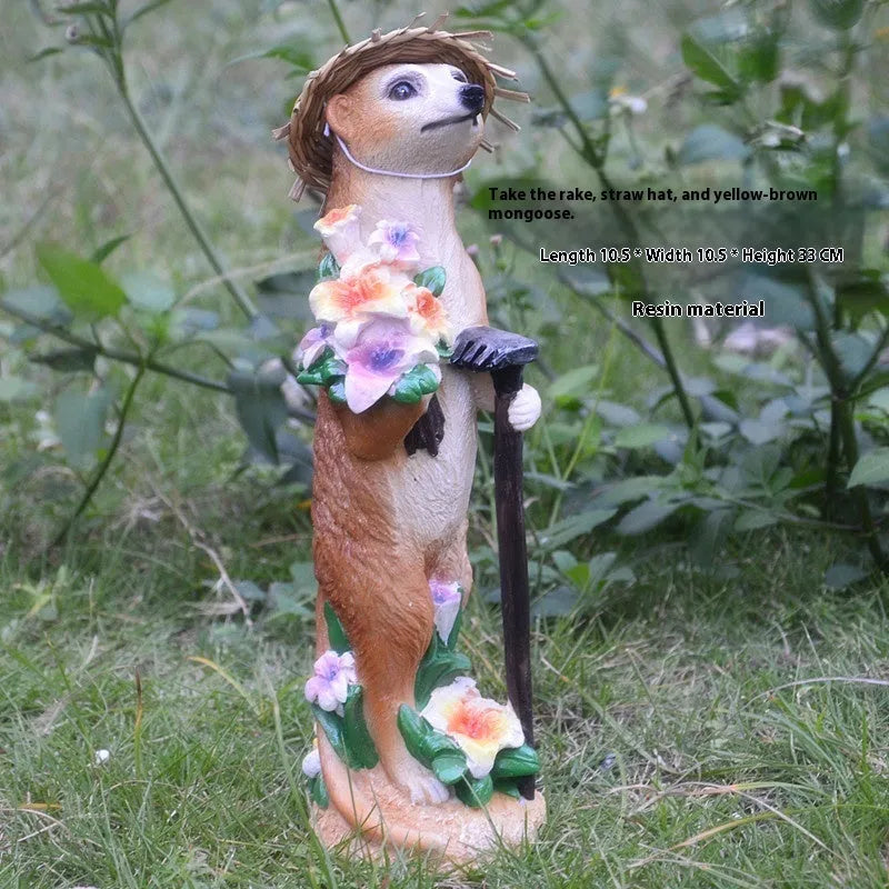 Straw hat mongoose ornament set with gardening tools in yellow brown and straw colour variations