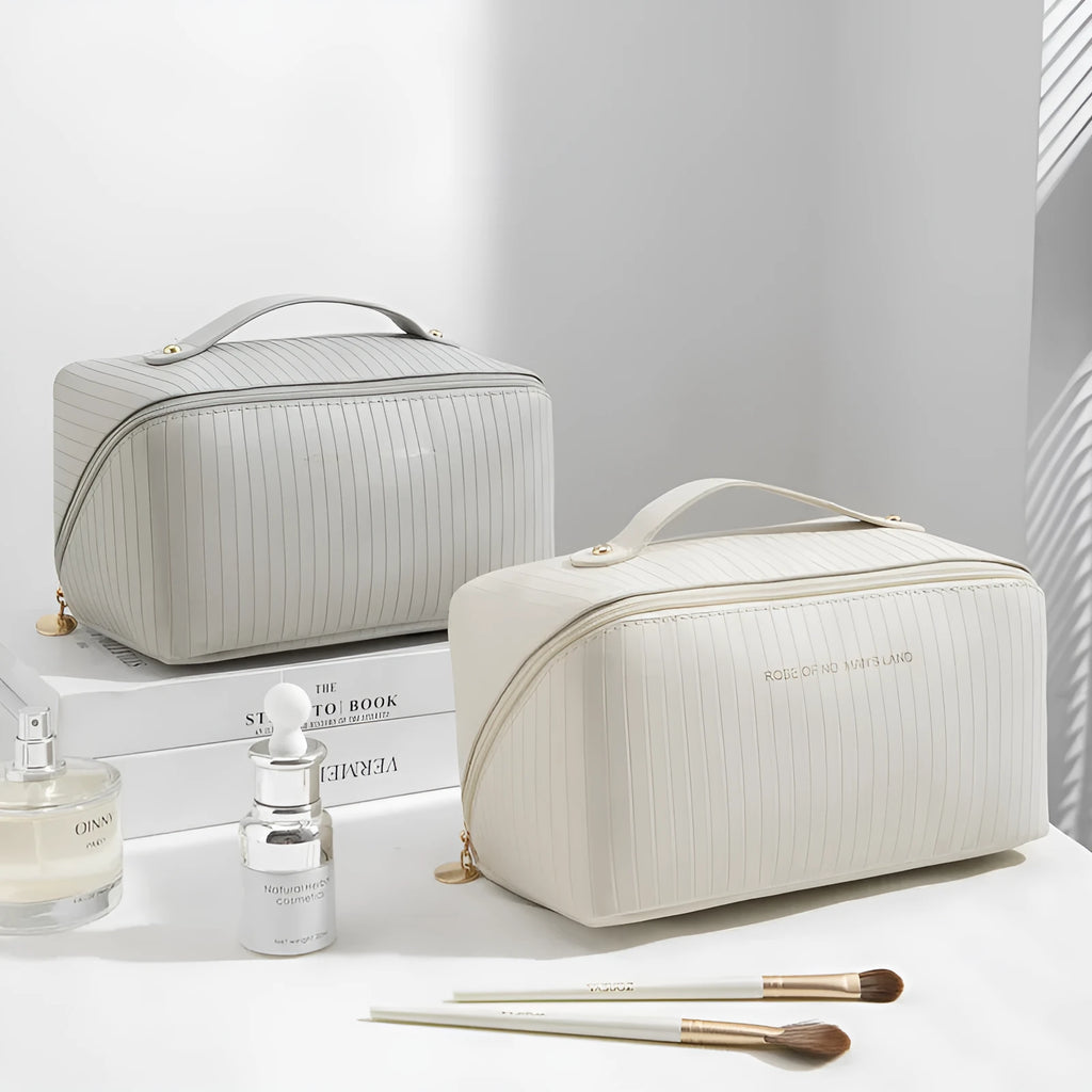 Cubic pillow makeup bag with vertical pattern in five colour options showing 22.5cm dimensions