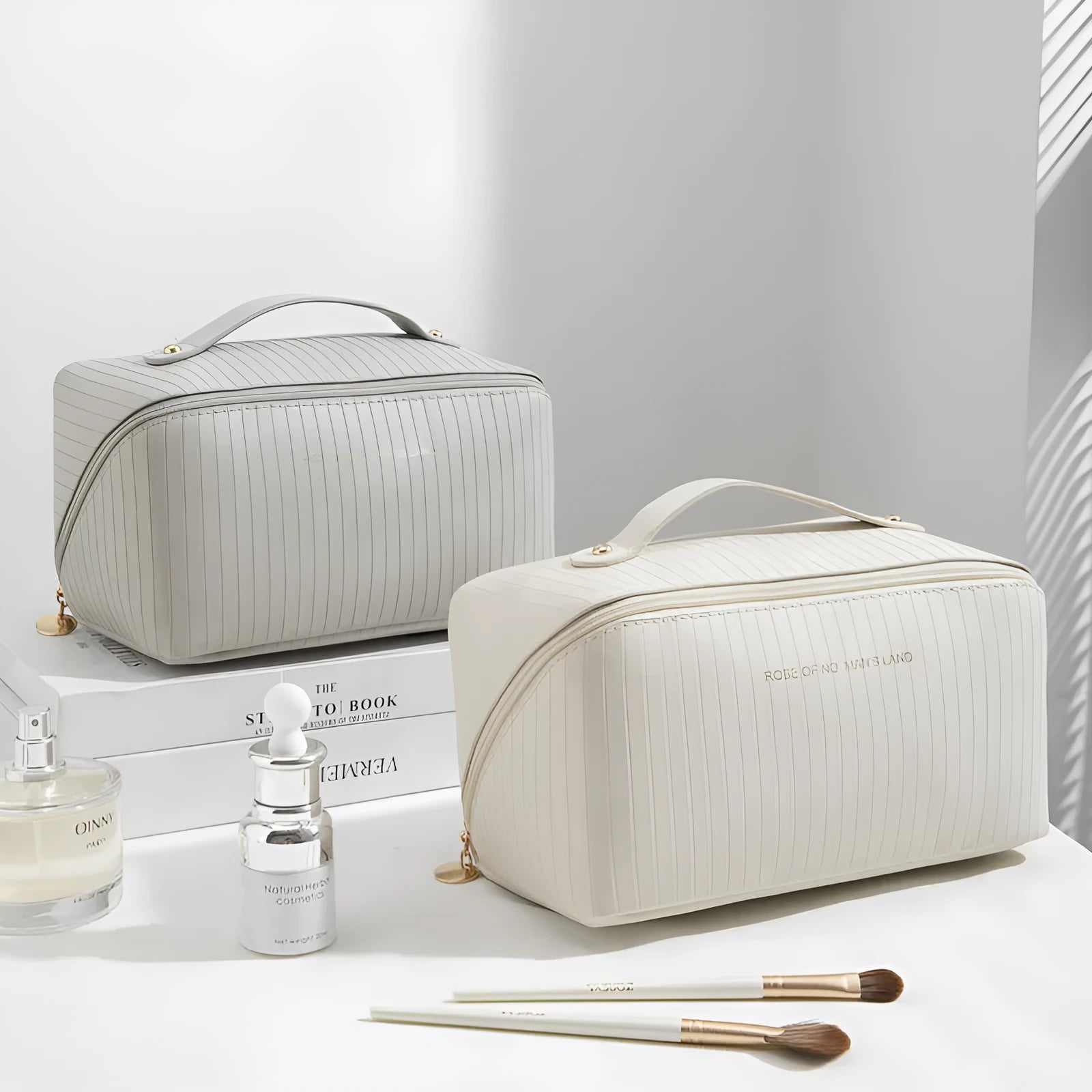 Cubic pillow makeup bag with vertical pattern in five colour options showing 22.5cm dimensions