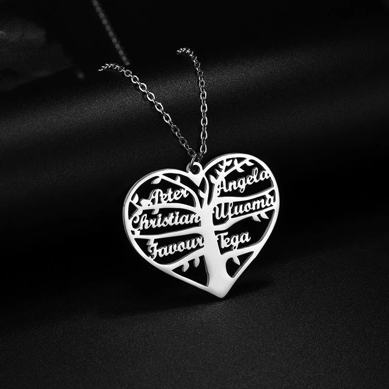 Personalised stainless steel necklace with engraved names on a heart and tree pendant in silver, gold, or rose gold.
