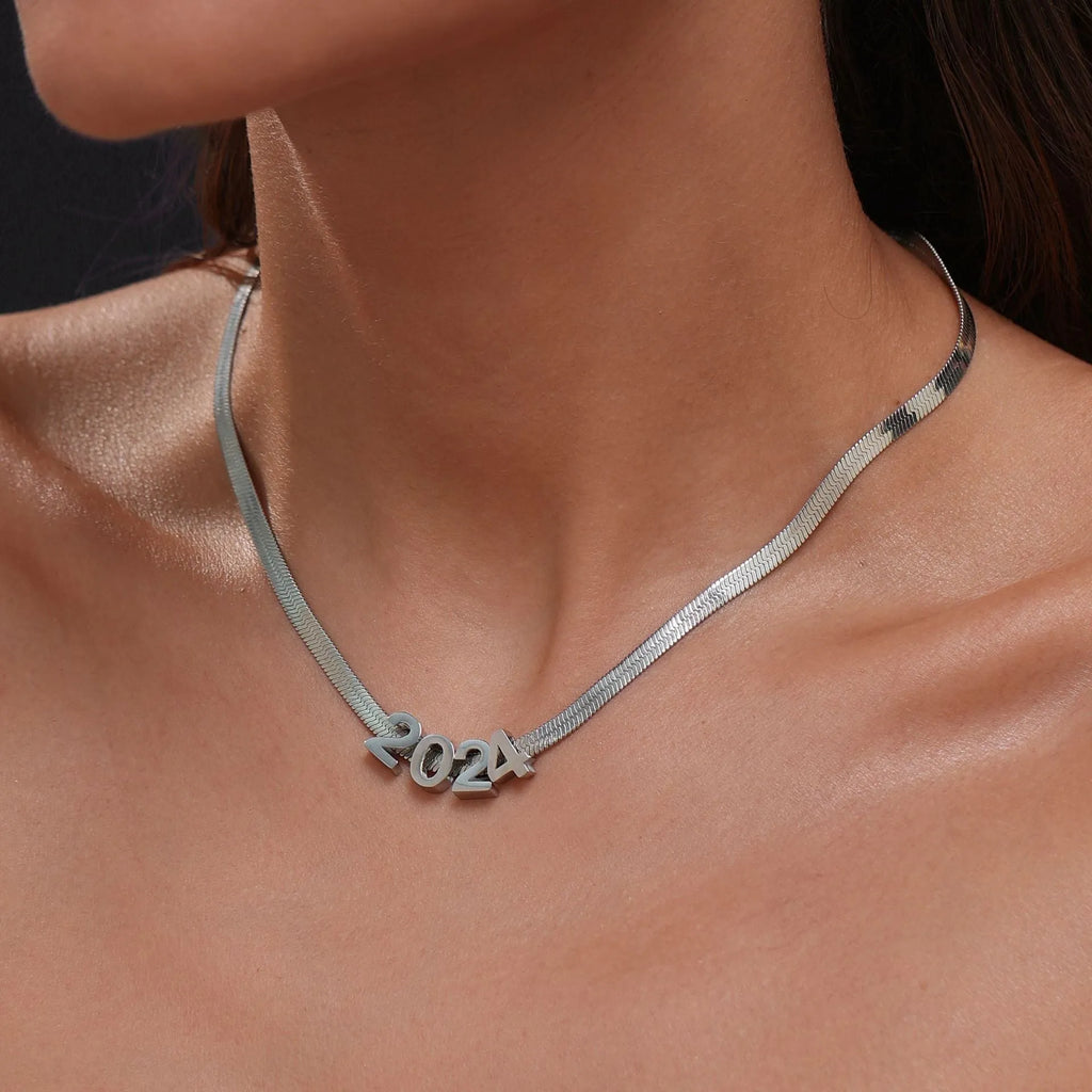 Titanium steel personalised necklace with a charm showing the letter A on a 40.5cm chain.