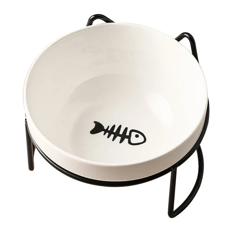 White ceramic pet bowl with cat paw print pattern in black iron frame stand