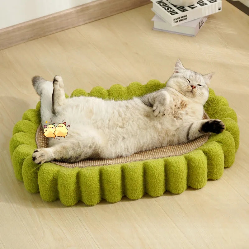 Green oval sisal cat scratching pad bowl serving as a cat bed and furniture protector