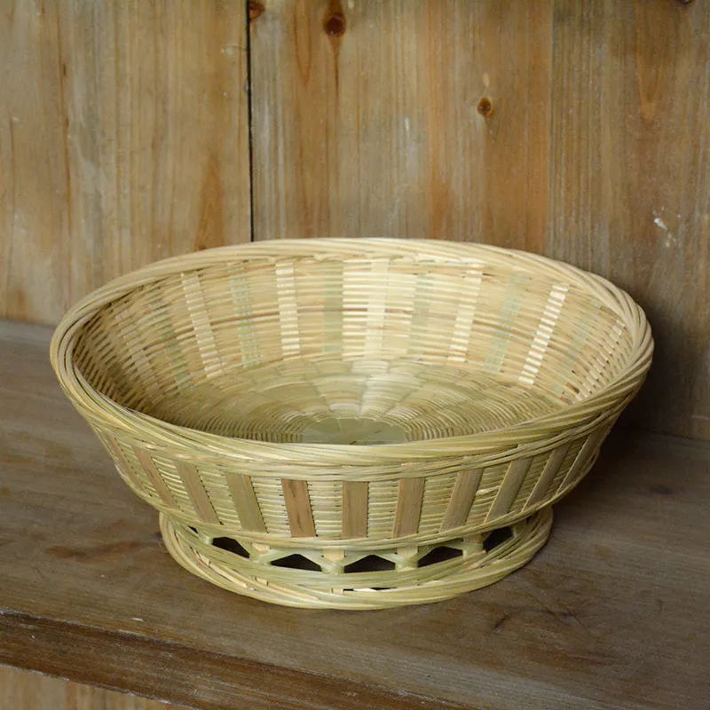 Handmade woven bamboo storage basket in natural colour showing traditional craftsmanship