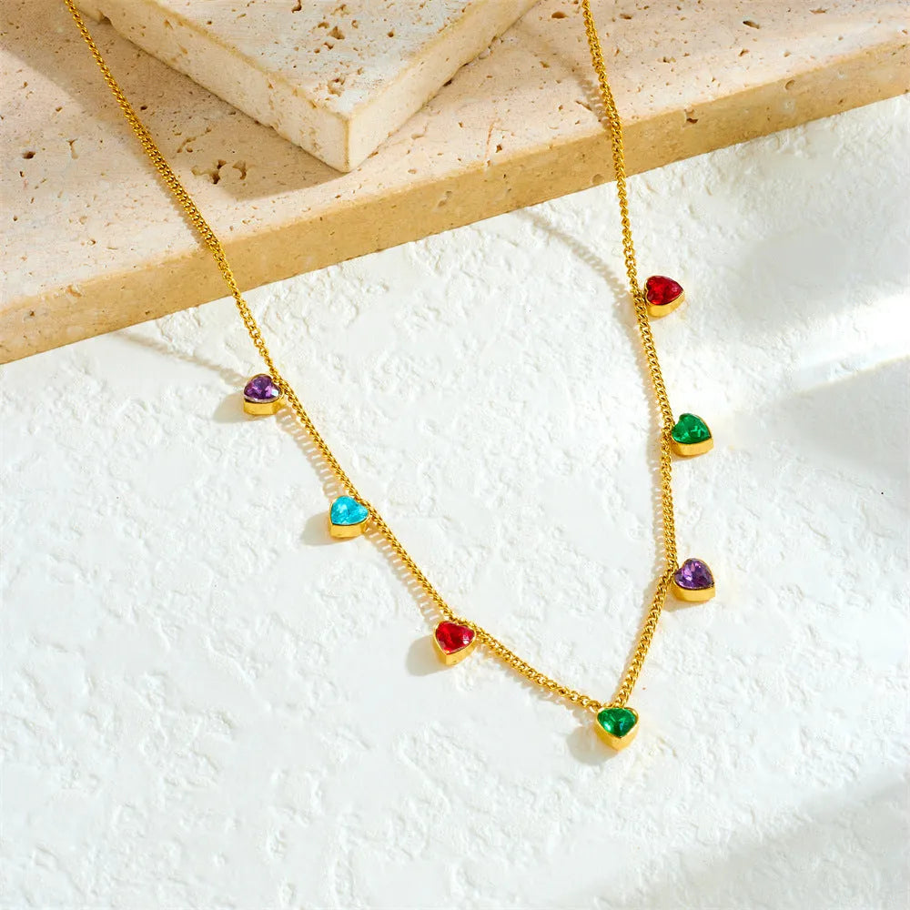 Gold-coloured heart pendant necklace for women on an adjustable chain.