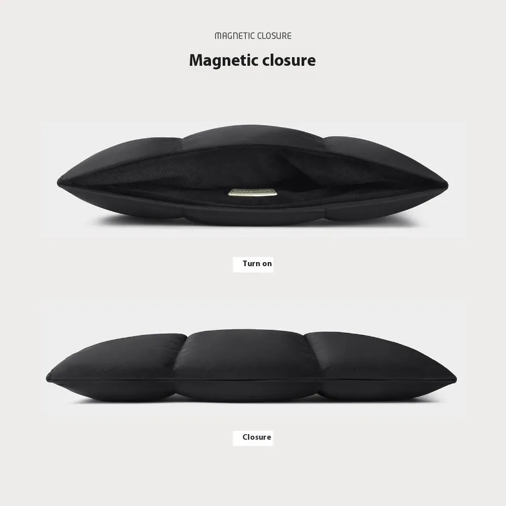 Soft black polyester laptop sleeve for a 15.6-inch device with sewing thread detail.