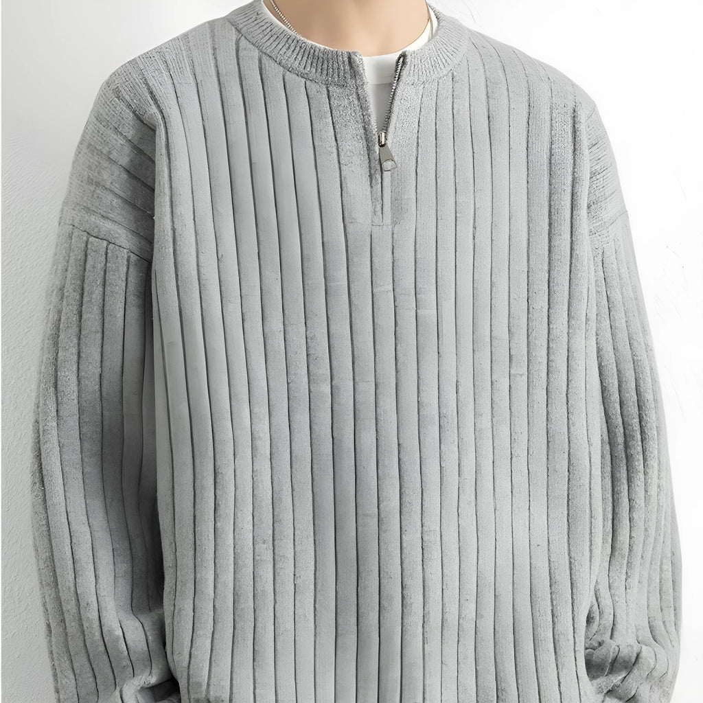 Men's grey loose fit half zip pullover sweater with textured knit and long sleeves