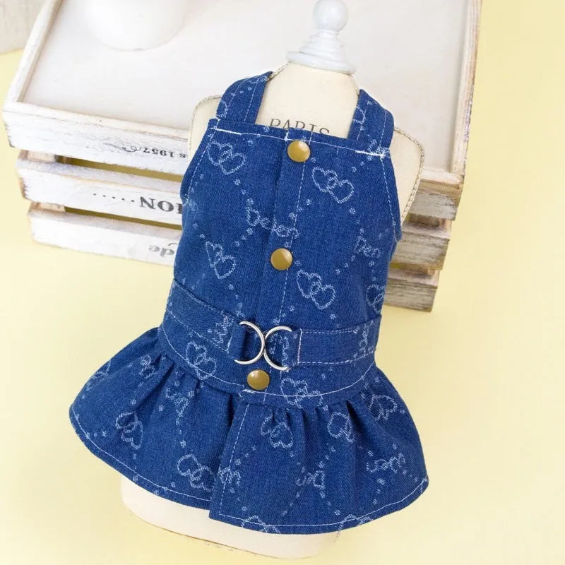 Denim princess dress for small dog on hanger showing bracket detailing and lightweight construction