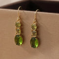 Green geometric bohemian earrings with quadrilateral design on copper alloy