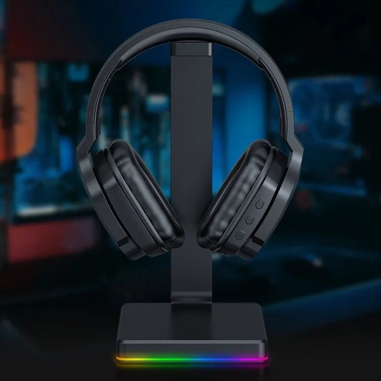 Luminous black wireless gaming headphones with head-mounted design showing ear cushions and adjustable headband