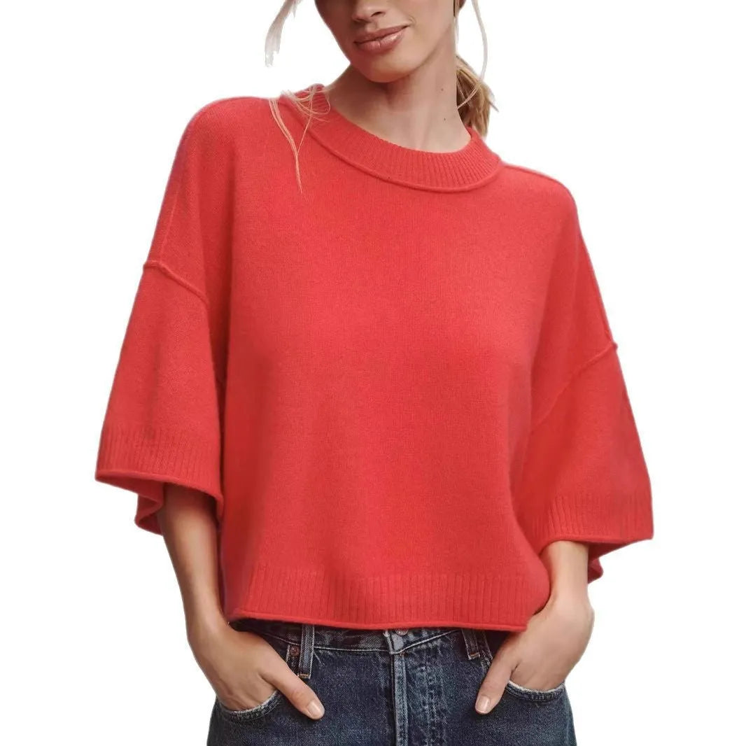Red or white short viscose fibre T-shirt with an exposed navel cut, shown on a model.