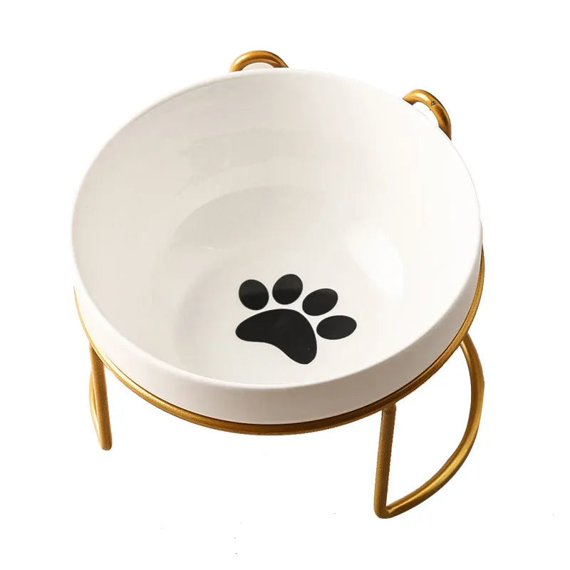 White ceramic pet bowl with cat paw print pattern in black iron frame stand