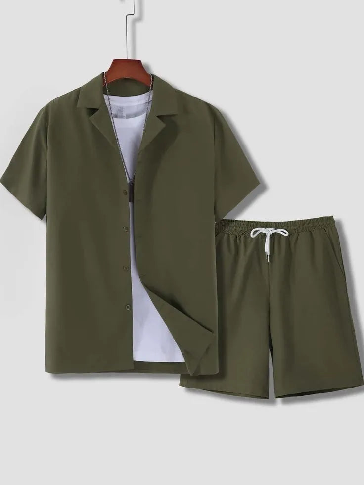 Man wearing a white short sleeve Cuban collar shirt and matching shorts from a lightweight polyester sport suit set.