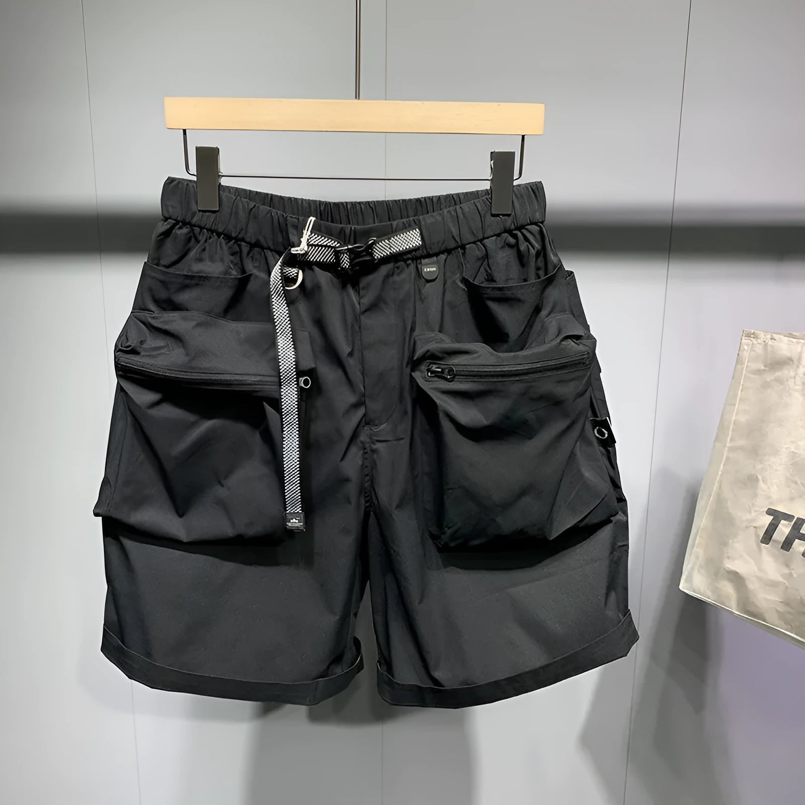Men's large size work shorts with pockets in black or grey with loose fit design