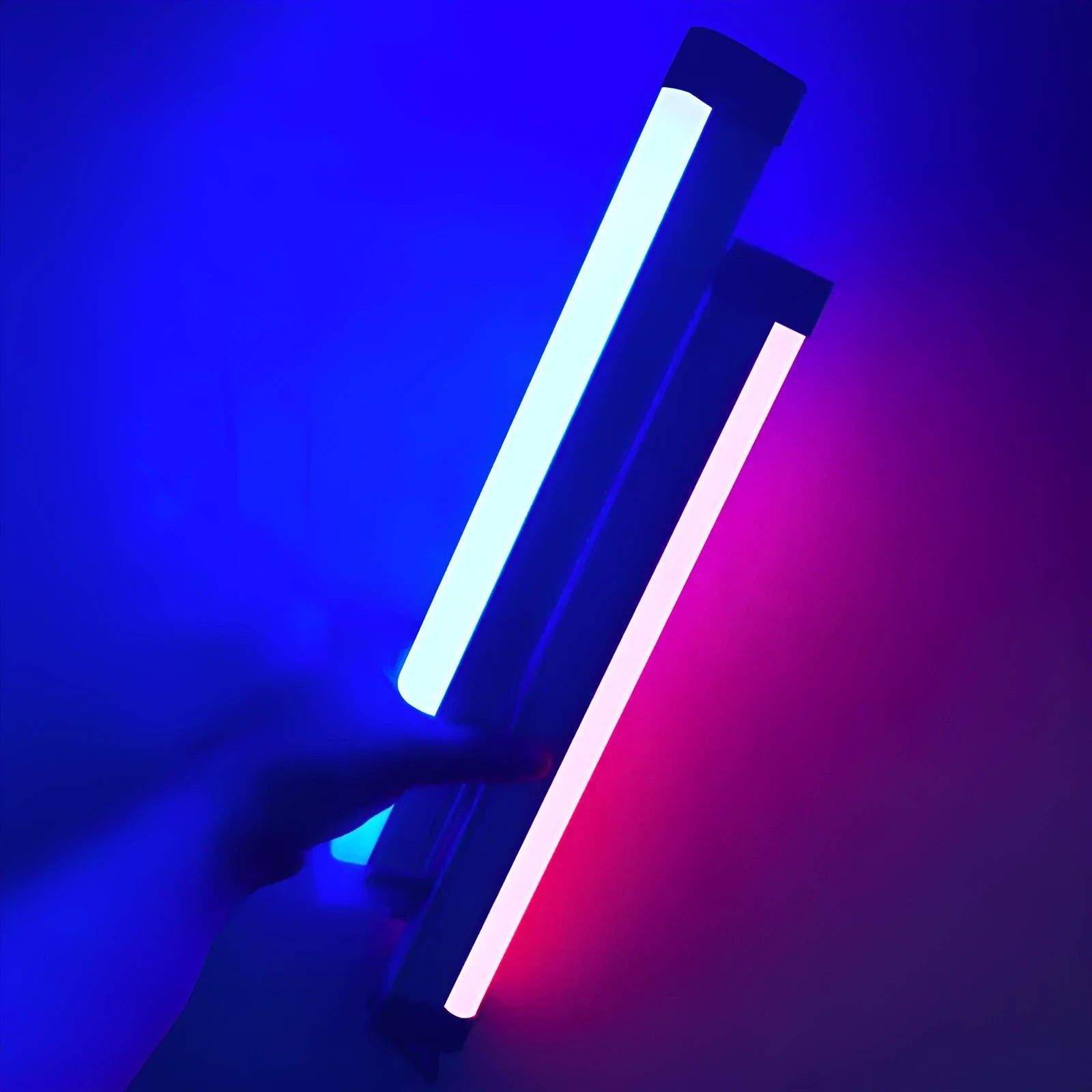 Rechargeable dimmable LED tube light in blue and purple colours shown in a bedroom setting.
