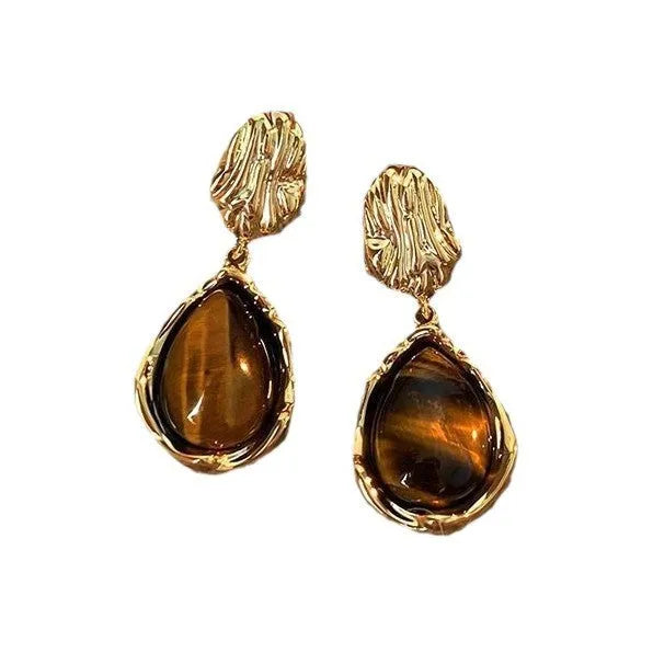 Three pairs of geometric alloy ear rings with tassel elements in different electroplated finishes