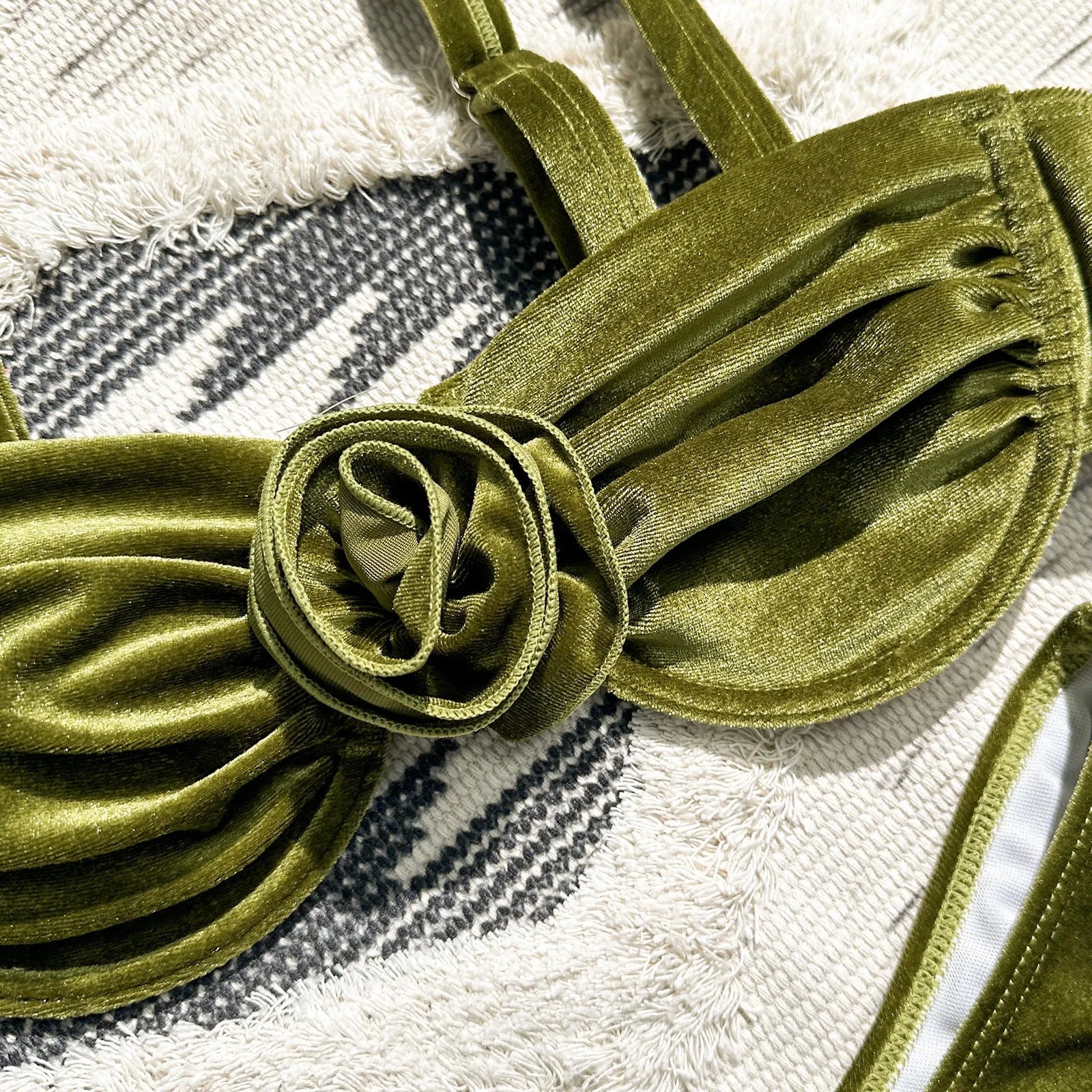 Women's green swimsuit with 3D floral pattern, brief cut, for fitness and swimming.