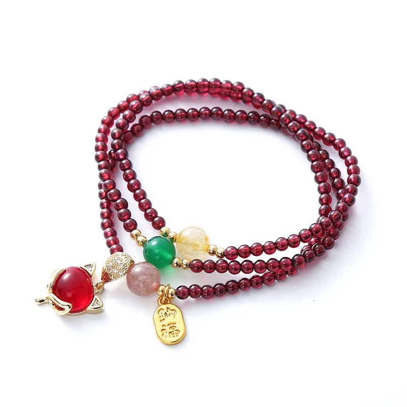 Purplish red garnet fox bracelet with adjustable cord for women