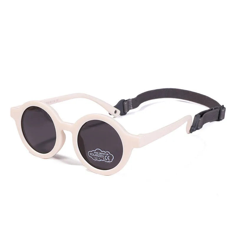 Children's silicone sunglasses with round frame and polarised lenses in multiple colours for 0-3 year olds