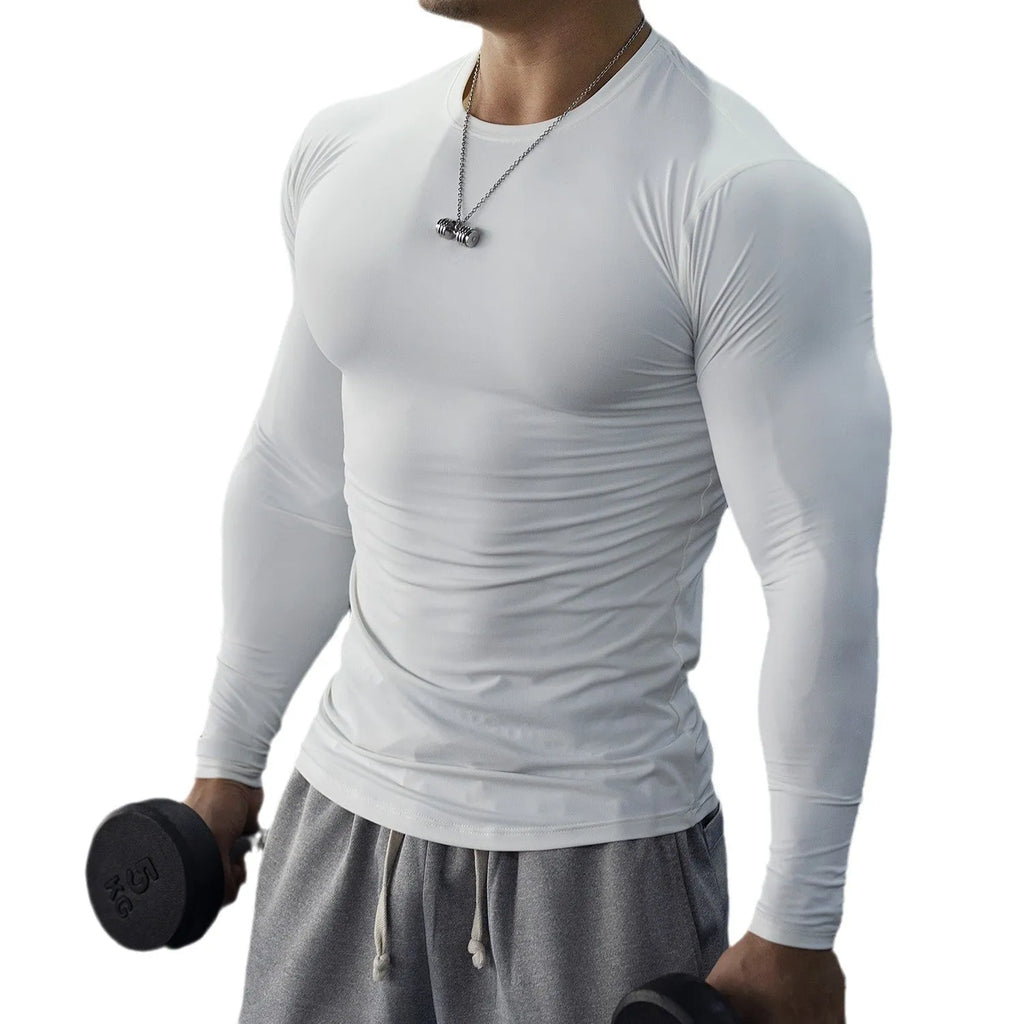 Man wearing black slim-fit long sleeve fitness tights for running or gym workout