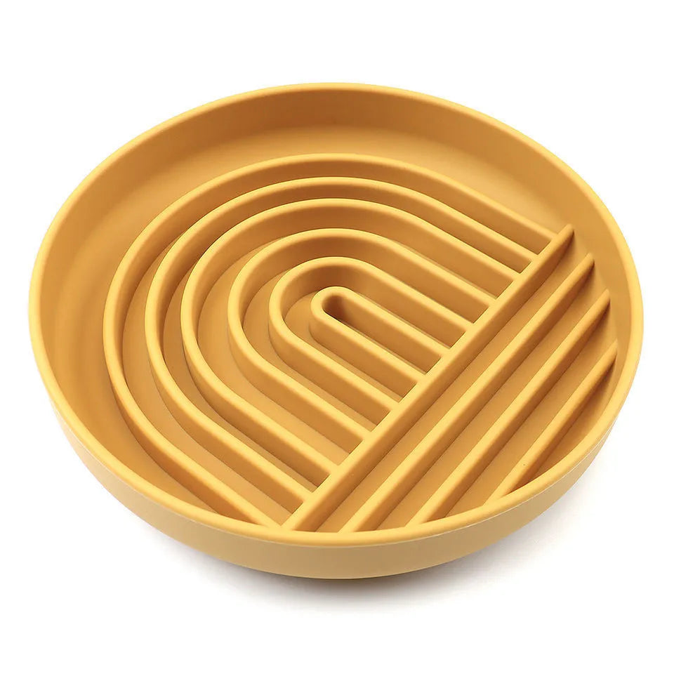 Silicone dog slow feeder bowl with textured ridges, shown in mustard green colour.