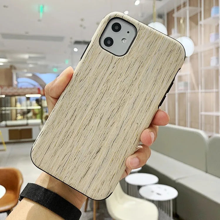 Natural wood iPhone case in back cover style showing timber grain patterns