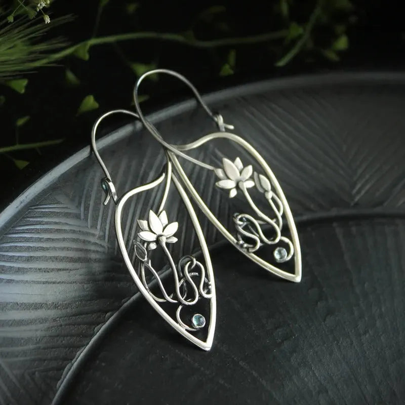 Silver electroplated alloy earrings with lotus vine geometric design and retro styling elements