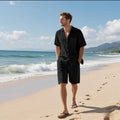 Linen blend casual short sleeve shirt and matching shorts set laid flat, shown in light blue colour.