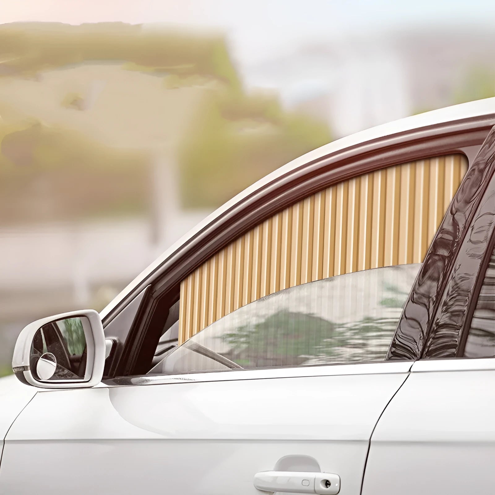Auto retractable car sun curtain in black colour showing roller shutter mechanism