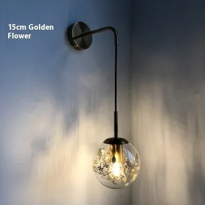Glass shade wall lamp in golden or silver finish with 15cm or 20cm diameter for bedroom lighting