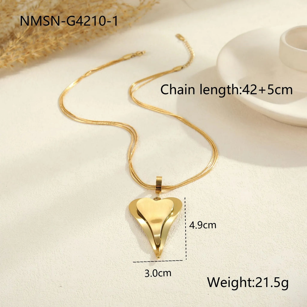 Gold stainless steel necklace with double heart pendant on snake bones chain