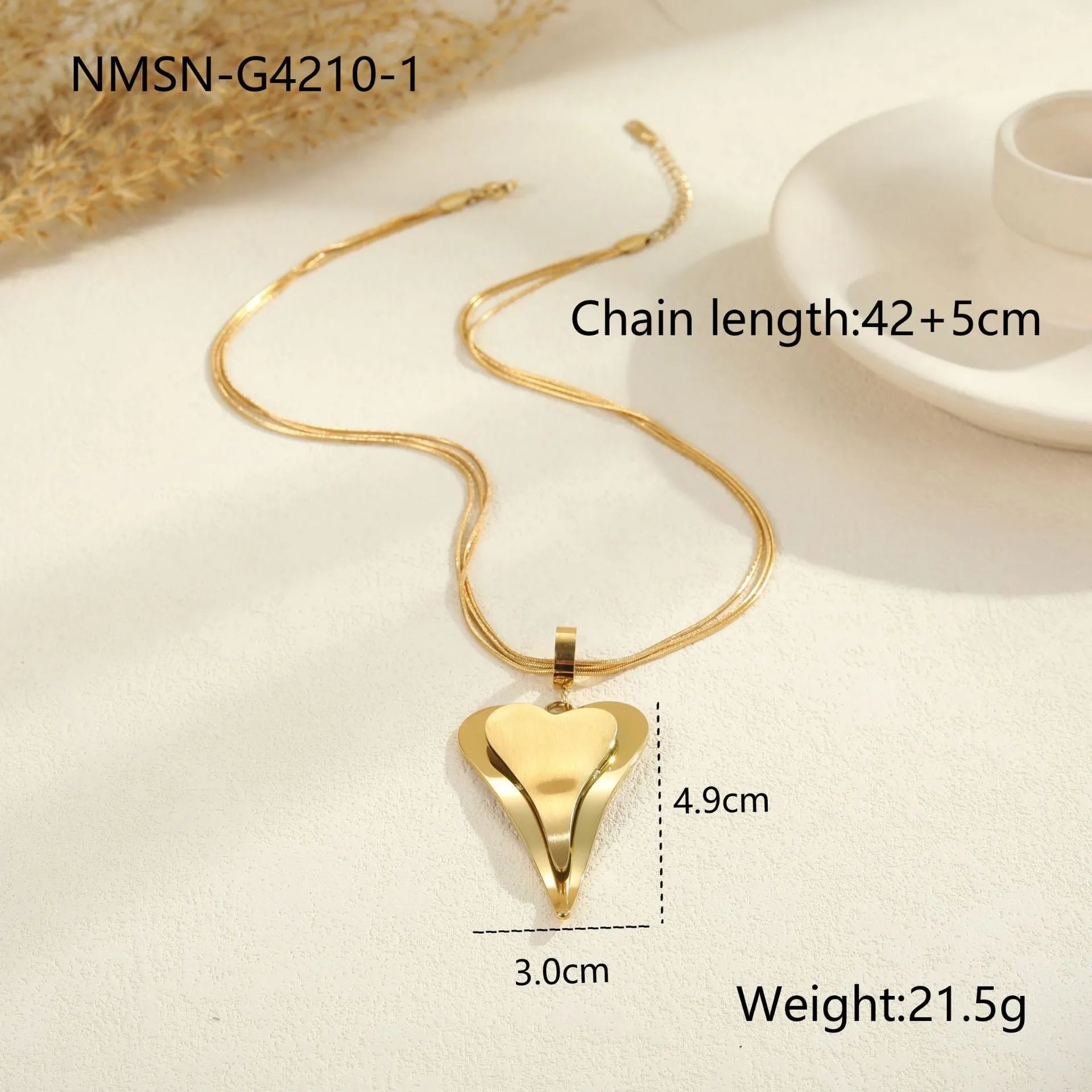 Gold stainless steel necklace with double heart pendant on snake bones chain