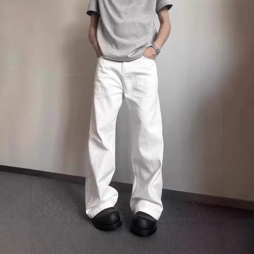 Men's white straight leg denim jeans with mid waist and zipper fly
