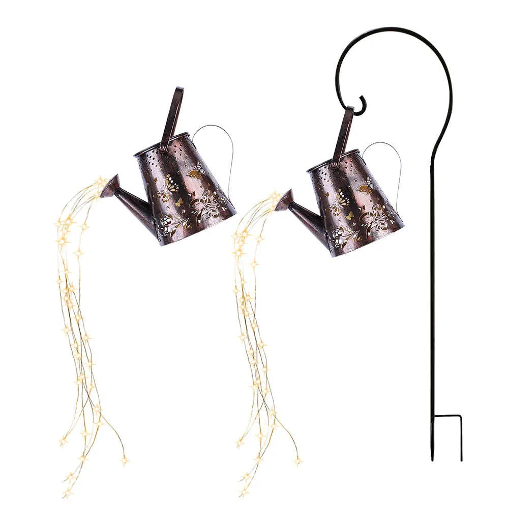 Solar garden lamp with tapered butterfly silhouette design in iron construction