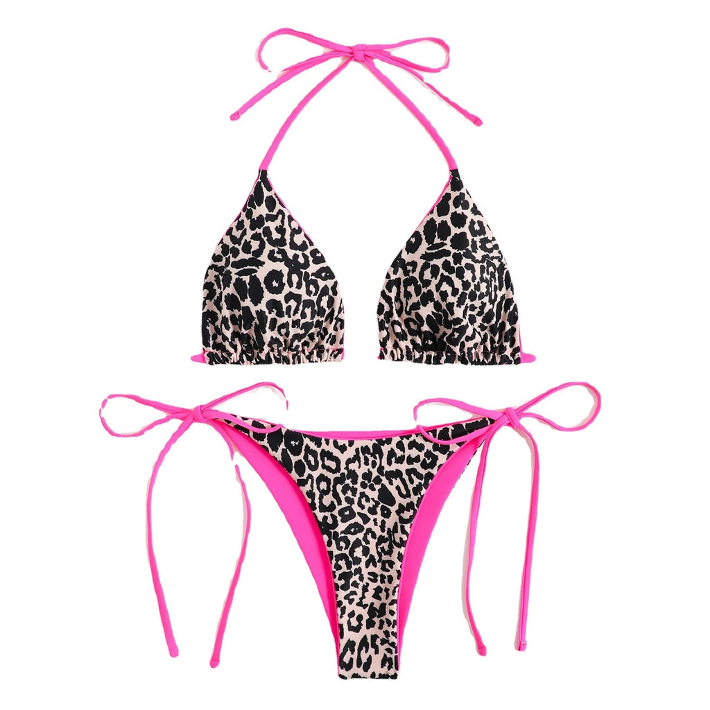 Women's lace-up front triangle bikini top with high-waisted split-leg swimsuit bottoms.