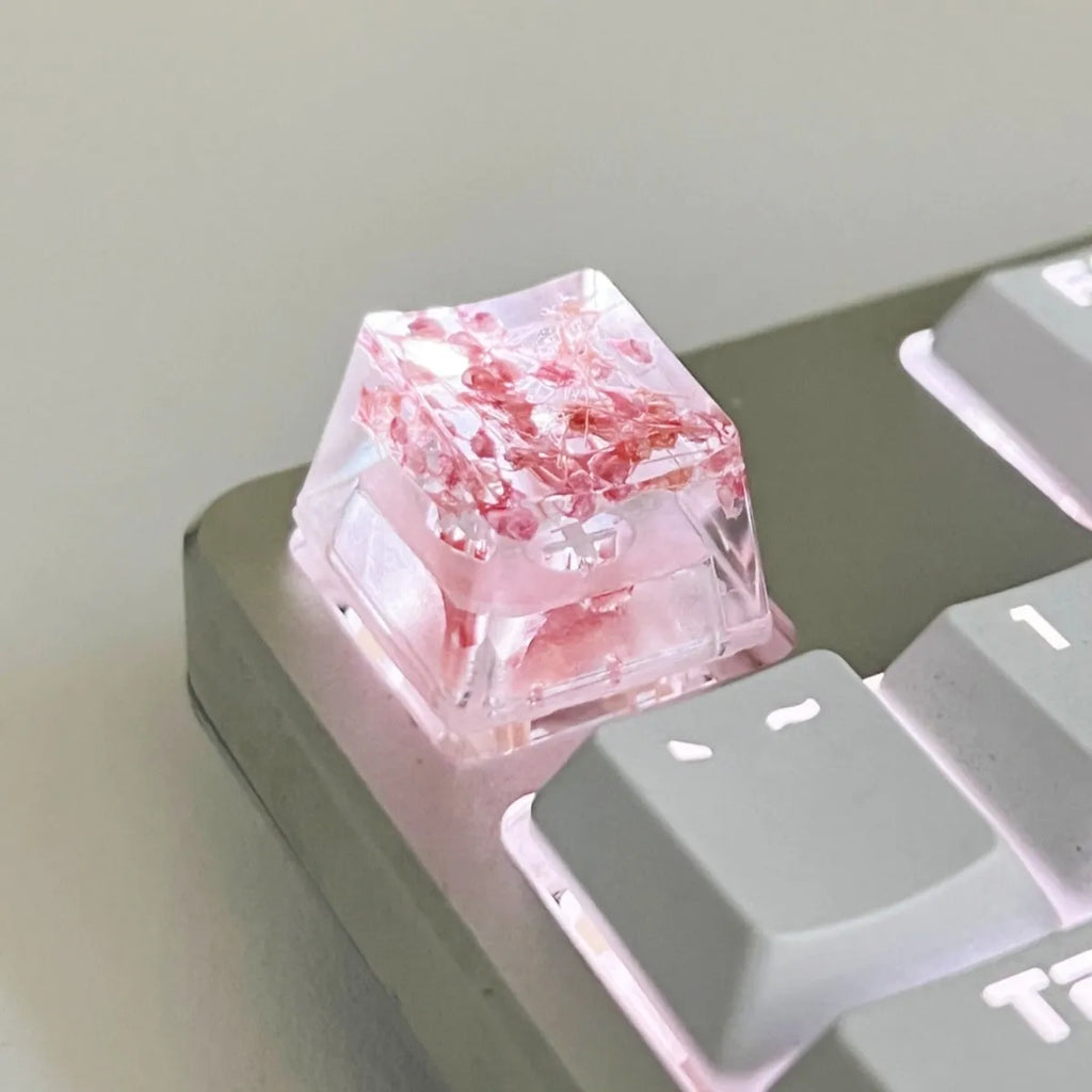 Resin starry sky artisan keycap in green, pink, red, or violet for mechanical keyboard customisation.