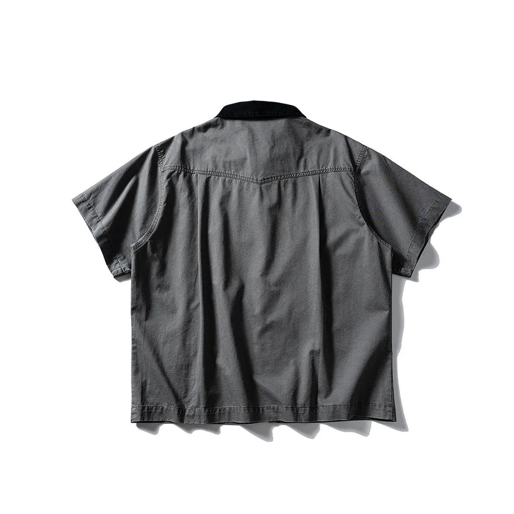Short sleeve washed overalls shirt in a loose cardigan style, shown in khaki colour.