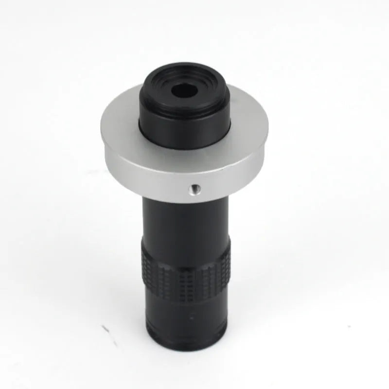 Black industrial camera monocular lens with 30mm diameter, 84mm length, providing 0.1-1.3X magnification