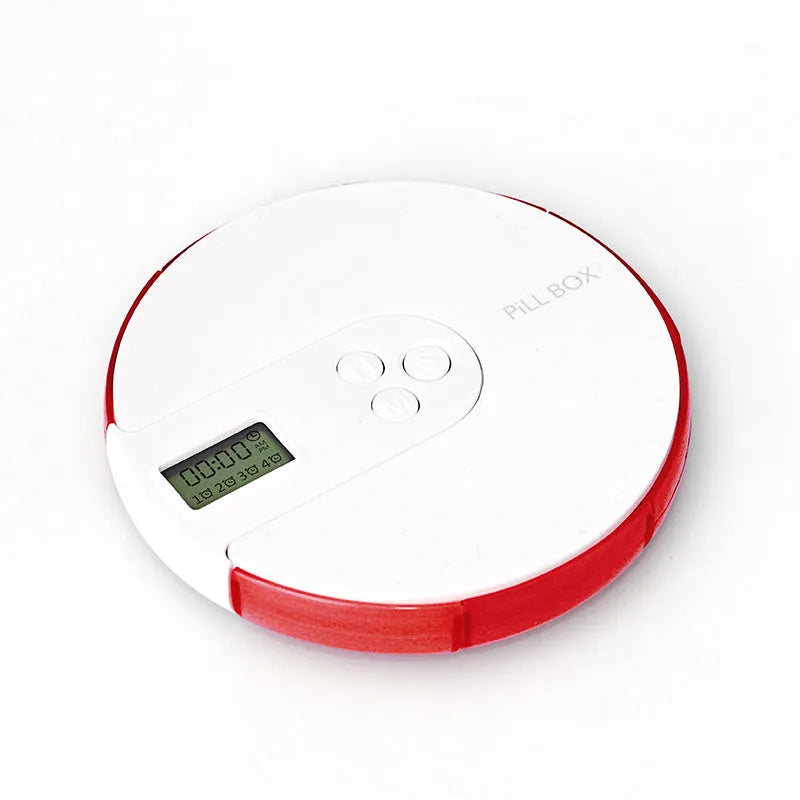 Blue 7-compartment alarm clock pill dispenser showing digital display and pill slots.