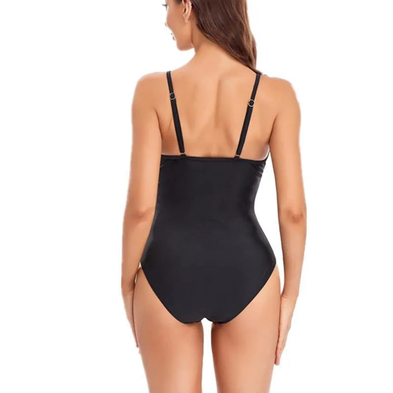 Ladies solid color backless one-piece swimsuit in black or blue with high elasticity tight fit