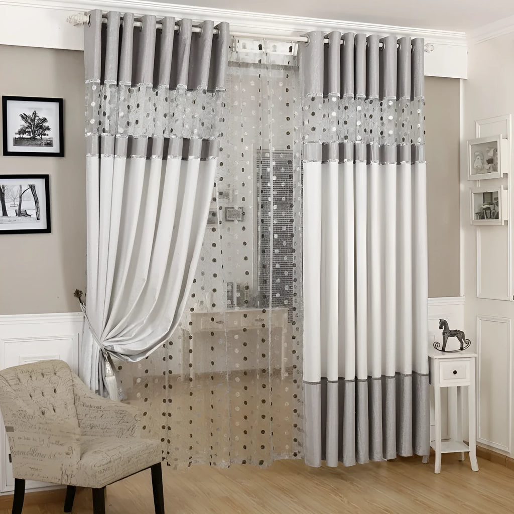 Single plain blackout curtain panel with hook tape heading, shown against a window.