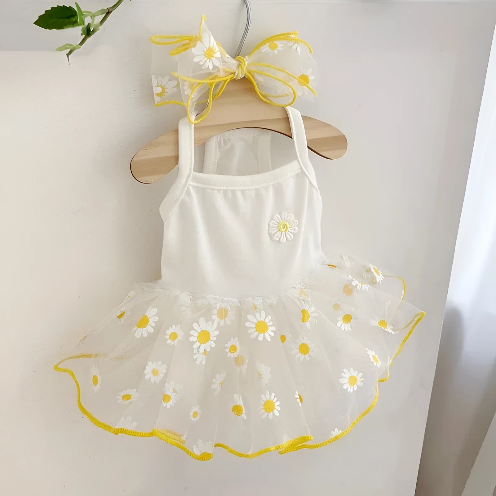 Yellow daisy print polyester dog clothing shown in sizes XS to XL for summer wear