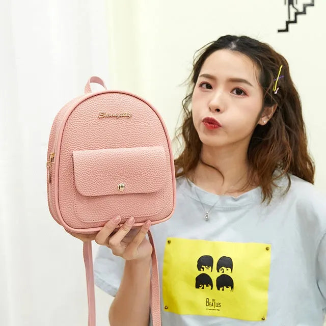 Women's black PU shoulder bag backpack compact letter purse with zipper closure