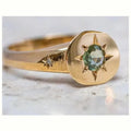 Golden adjustable ring with oval asterism zircon design and star shape