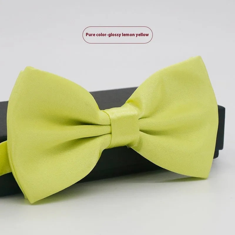 Men's solid colour formal bow tie in flat head style showing 12x6cm dimensions
