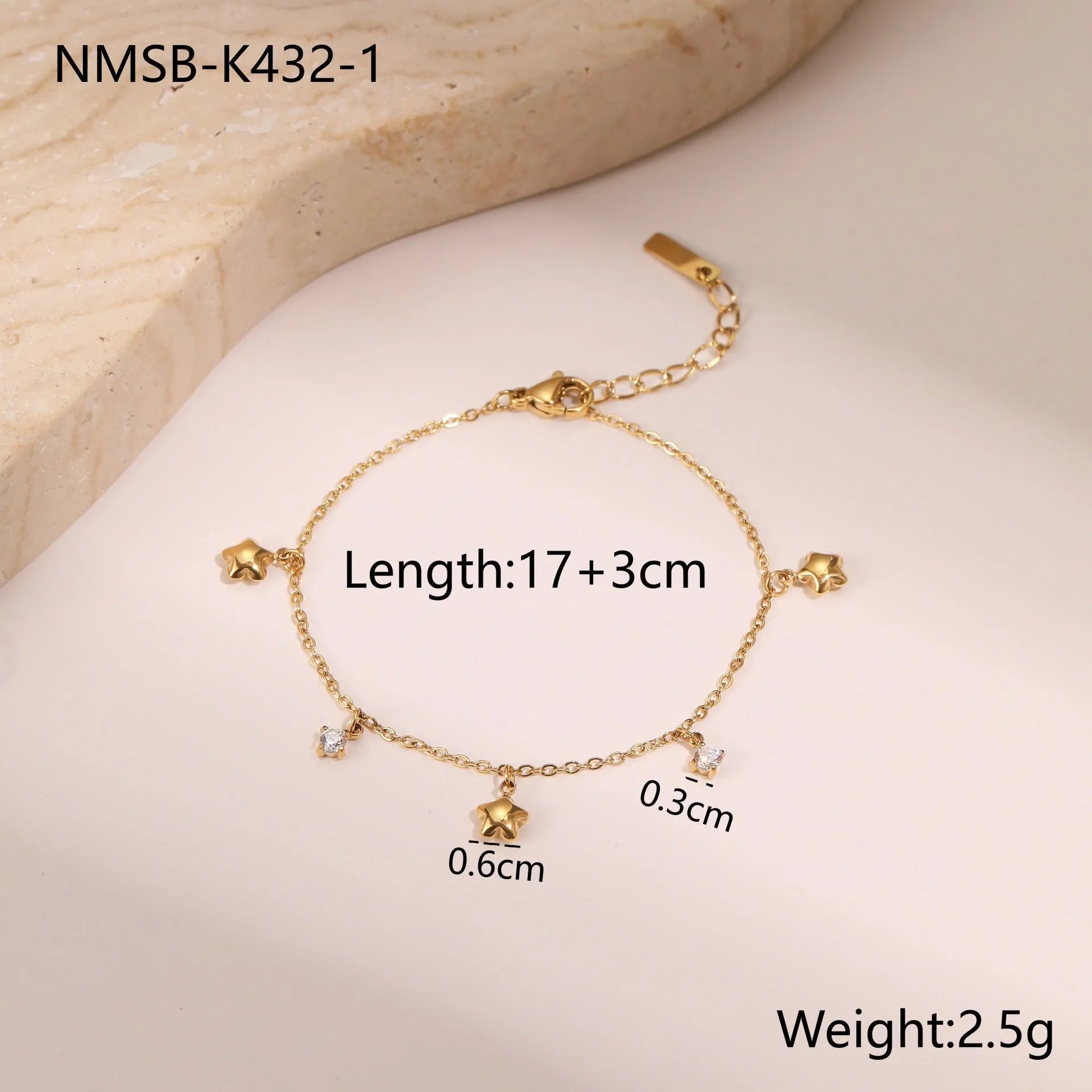 Stainless steel women's bracelet with geometric star pendant featuring hexagonal elements and gold plating