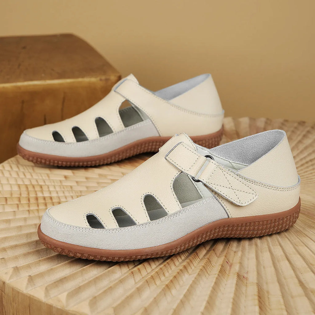 Plus size women's flat sandals with toe cap and hollow breathable design in blue, red, or white.