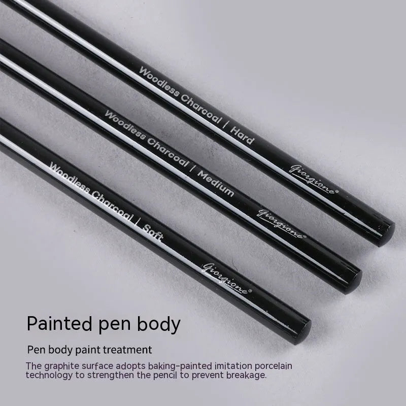 Set of nine wooden drawing pencils on a card, including graphite and carbonized pencils for sketching.