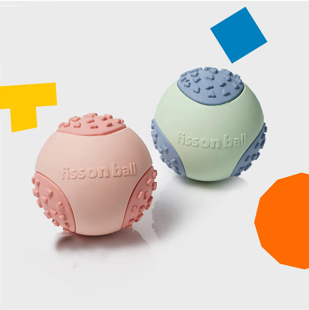 Green and pink interactive rolling ball dog toy 64mm diameter on a neutral background.